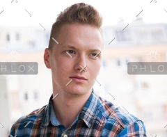 demo-attachment-17-man-standing-at-balcony-PBFGRDZ