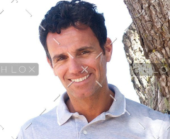 demo-attachment-16-smiling-middle-aged-man-standing-outdoors-PTRPK6H